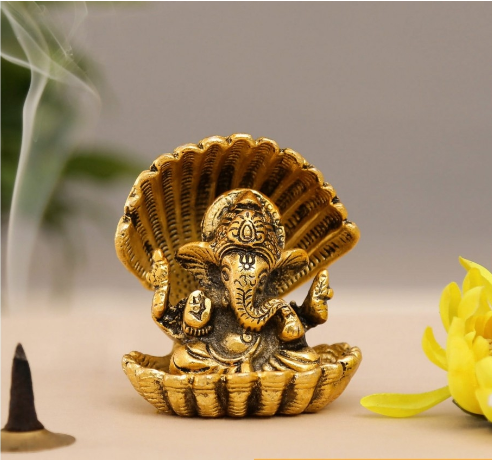 Ganesha sitting with snake gold plated for home decor and gifts